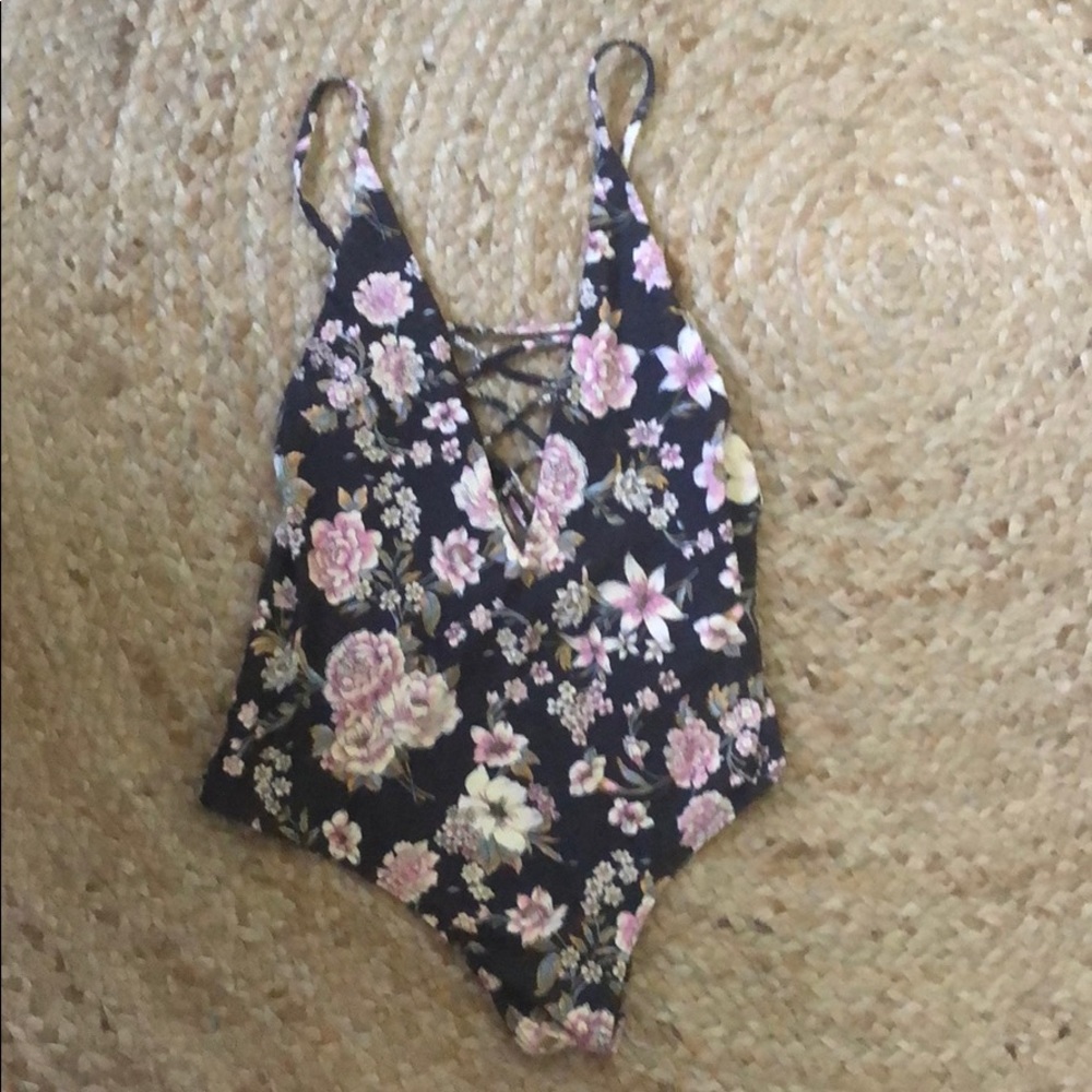 Billabong size SM floral one piece low back w/ tie